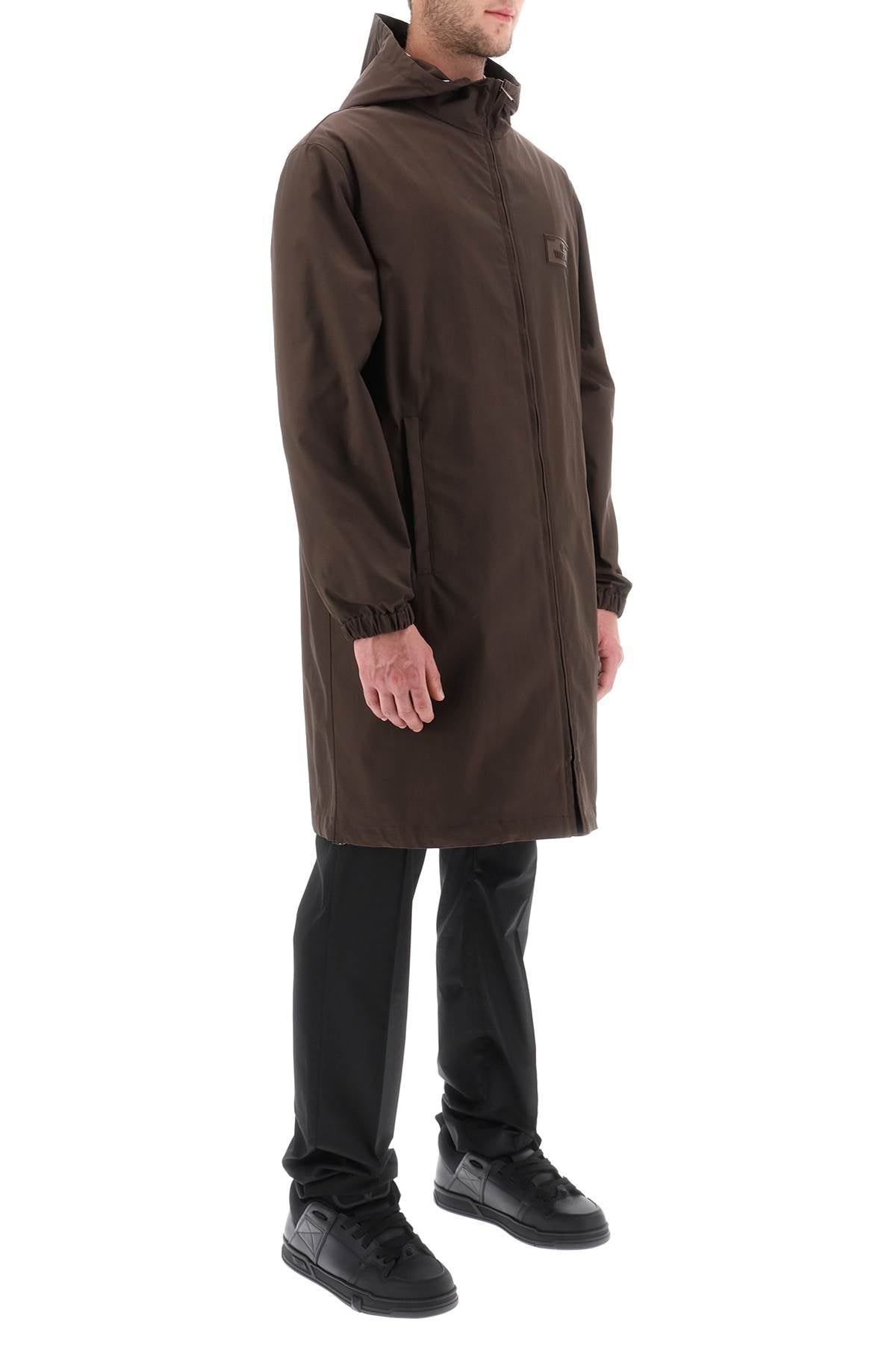 Valentino Garavani raincoat with maison valentino rubber label